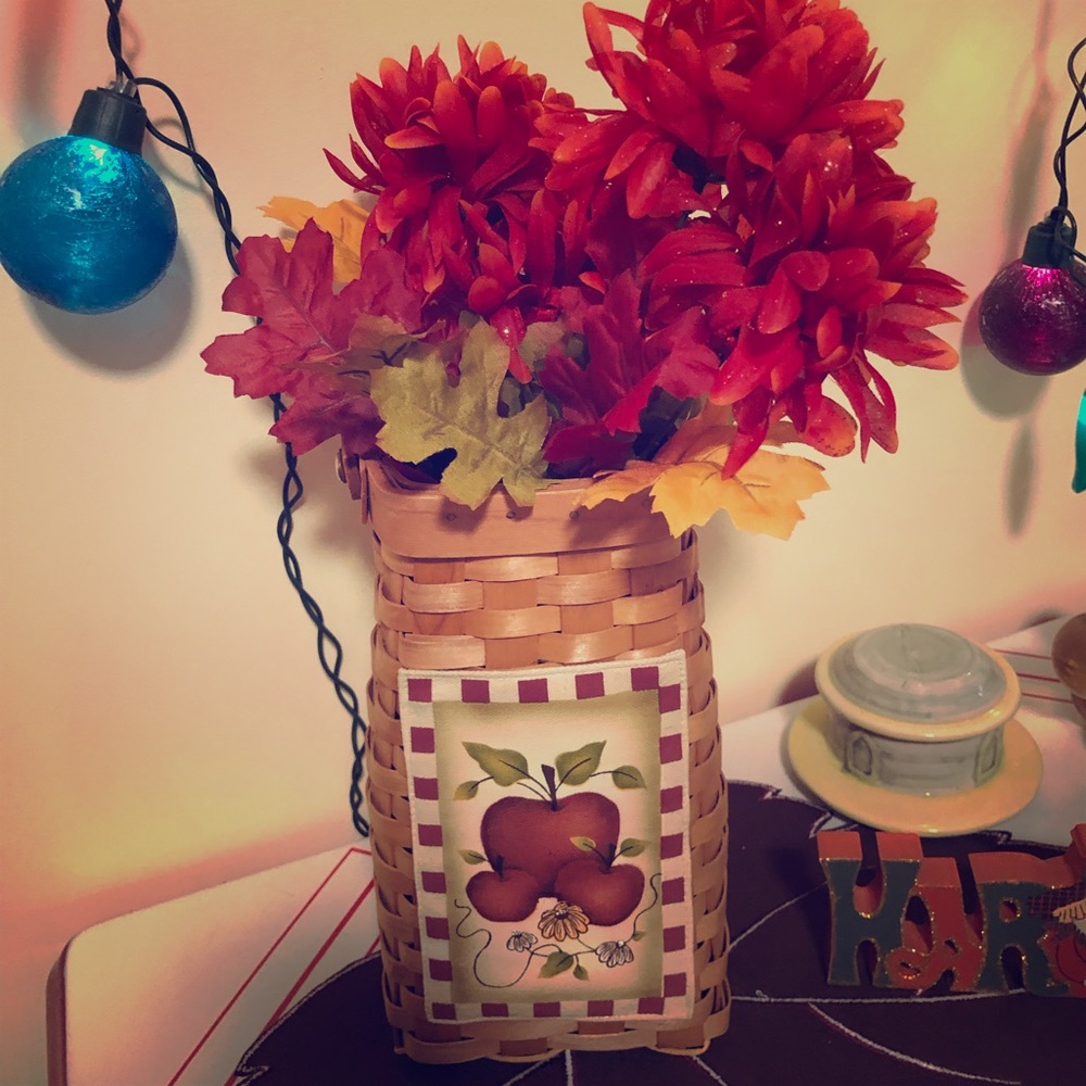 Woven basket with apples design